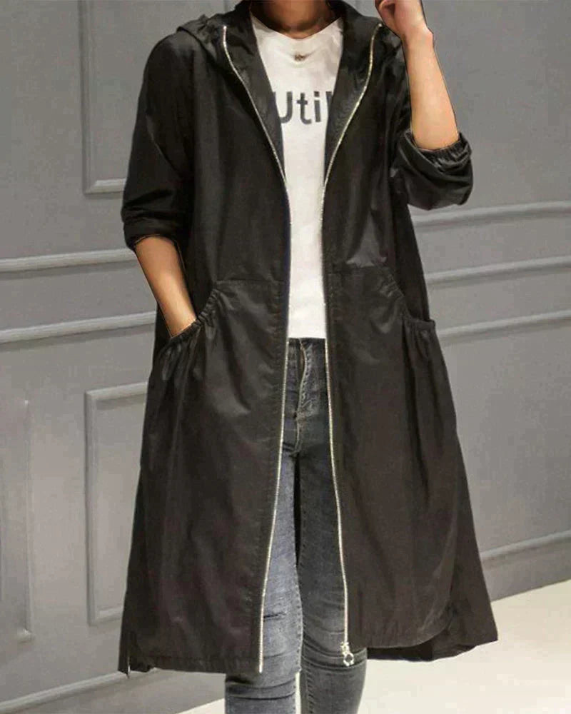 Women's Long Hooded Raincoat with Waterproof and Weatherproof Features and Zipper