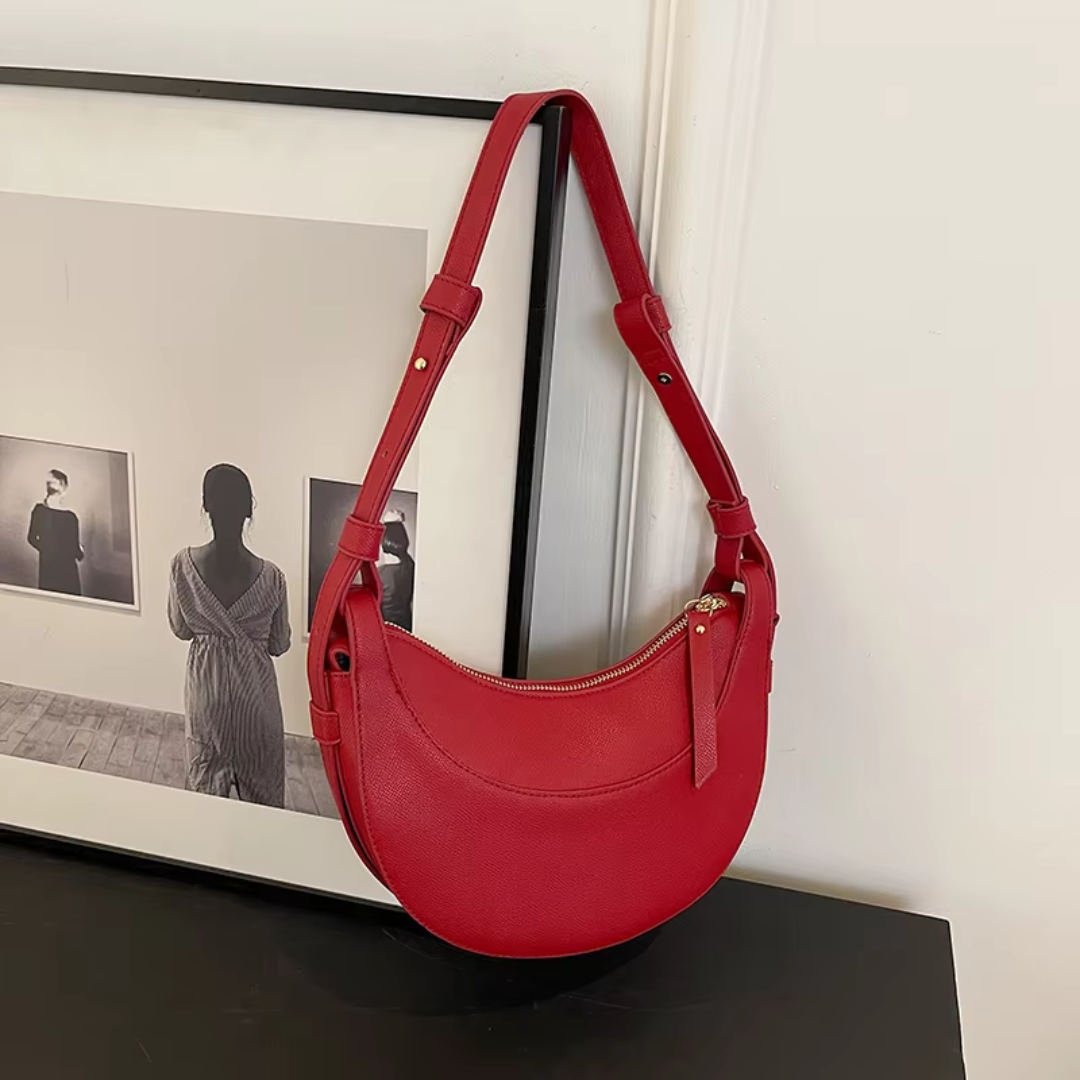 Women's Crescent-Shaped Shoulder Bag with Zippered Pocket and Adjustable Strap