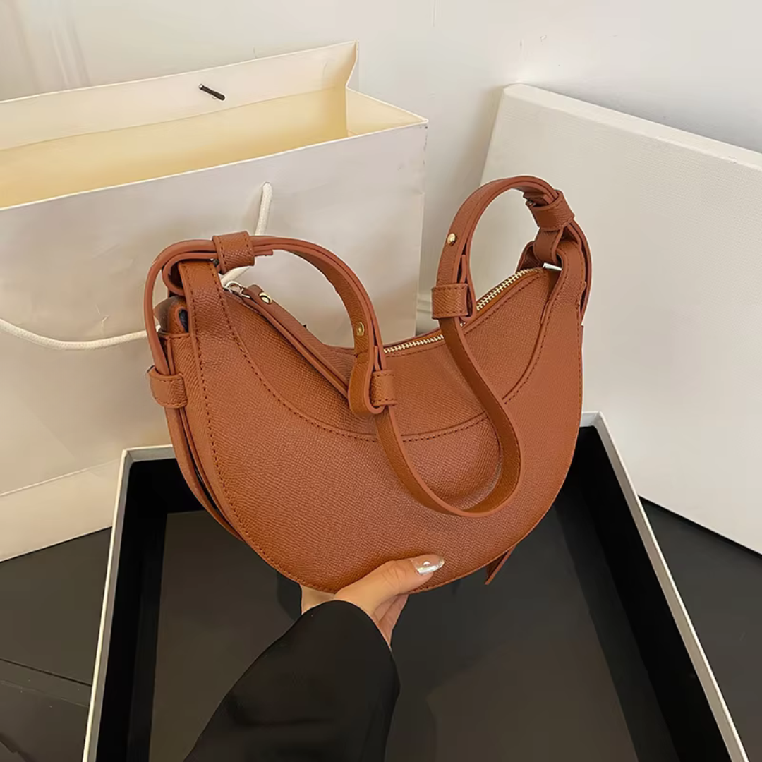 Women's Crescent-Shaped Shoulder Bag with Zippered Pocket and Adjustable Strap