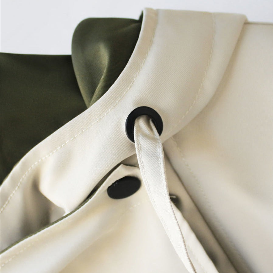 Women's Waterproof Windbreaker Jacket Featuring a Layered Hood Design