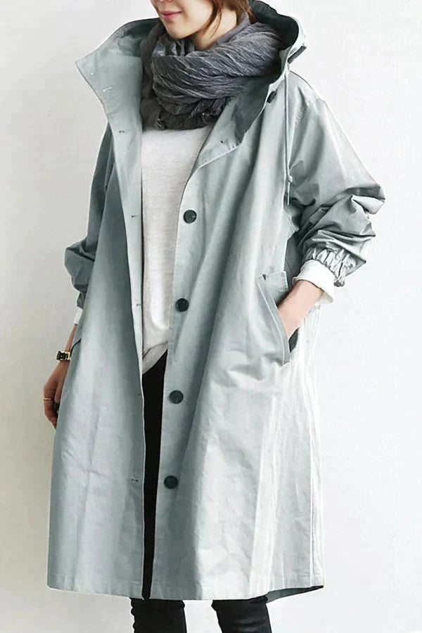 Women's Hooded Oversized Rain Jacket with Button Closure and Pockets