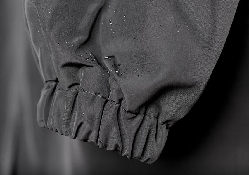 Women's Hooded Oversized Rain Jacket with Button Closure and Pockets