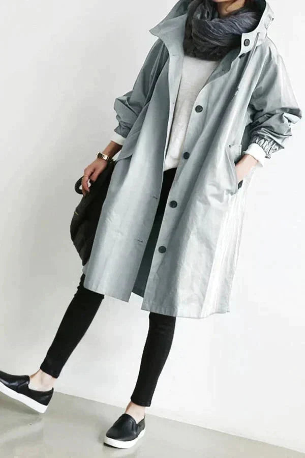 Women's Hooded Oversized Rain Jacket with Button Closure and Pockets