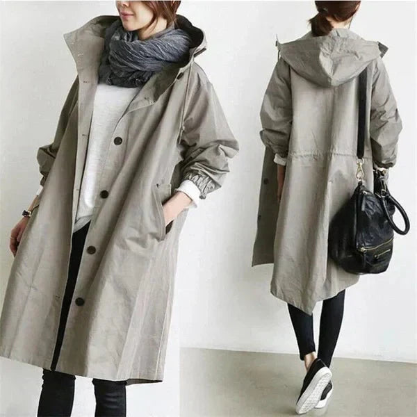 Women's Hooded Oversized Rain Jacket with Button Closure and Pockets