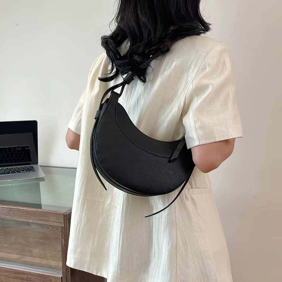 Women's Crescent-Shaped Shoulder Bag with Zippered Pocket and Adjustable Strap