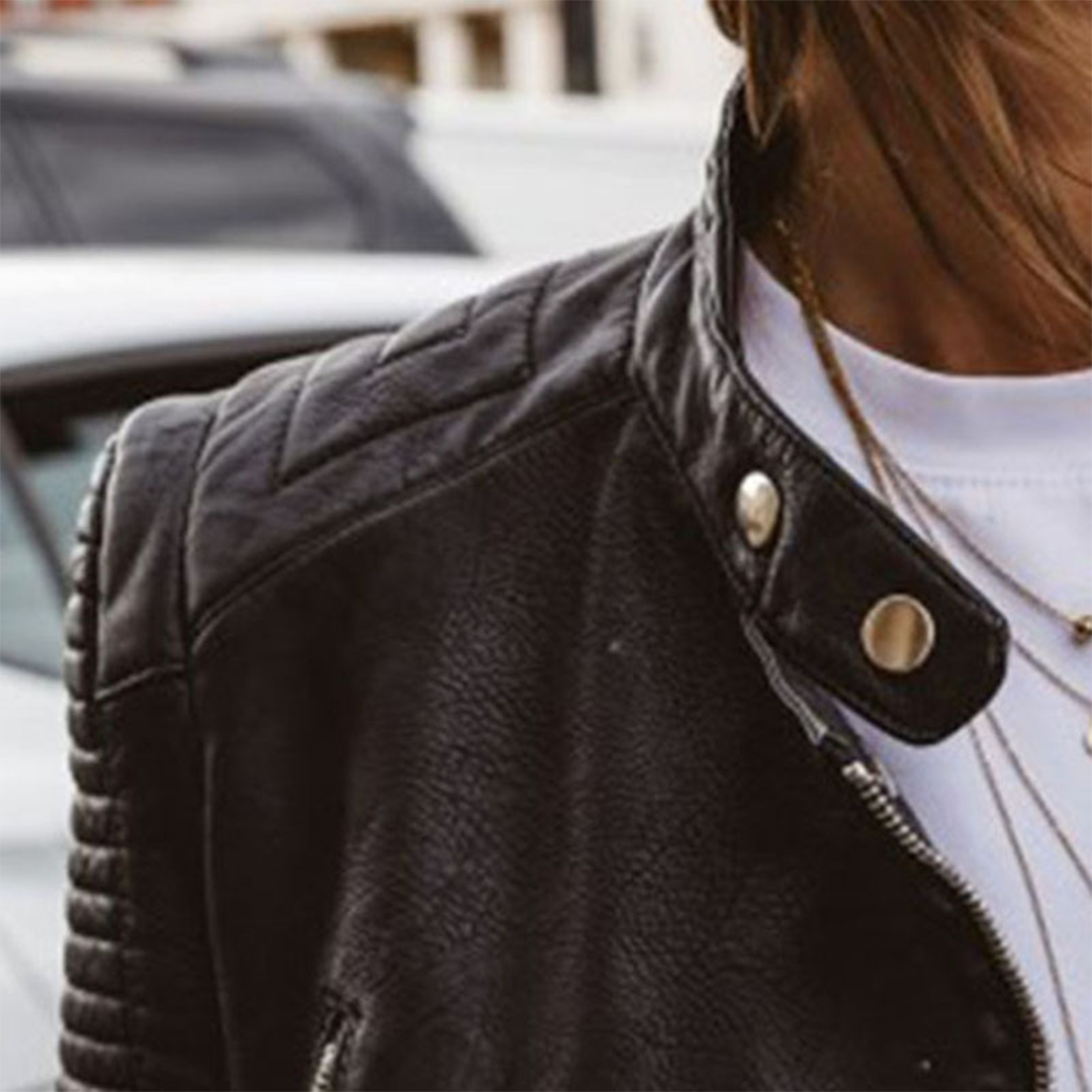 Women's Leather Biker Jacket Featuring Zip Accents and Ribbed Sleeves
