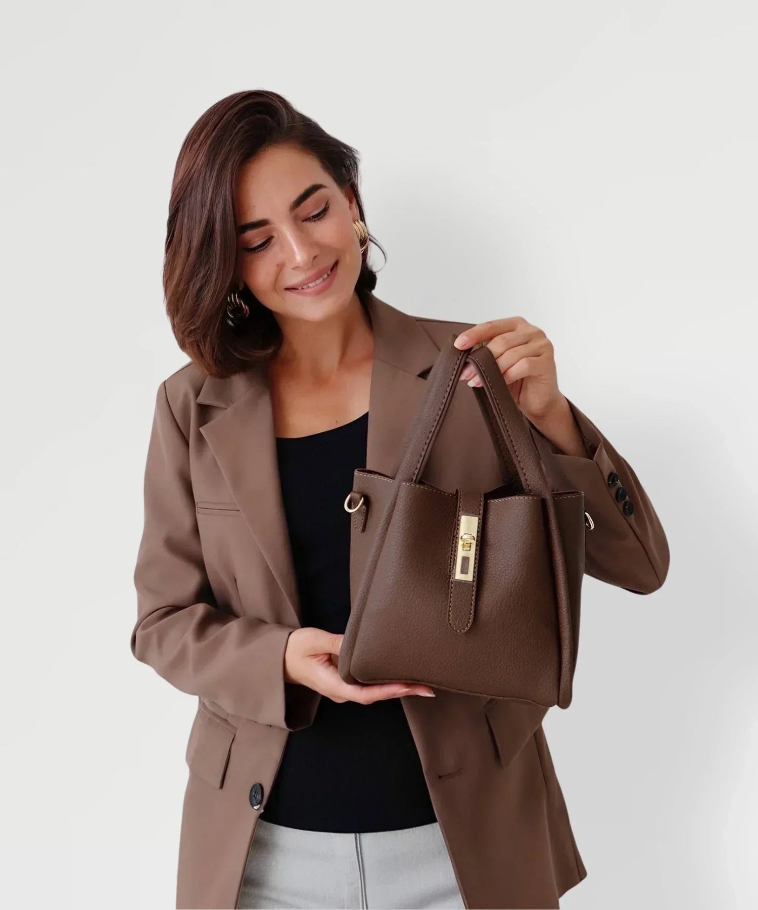 Women's Structured Handbag Featuring Top Handles and Gold Accents