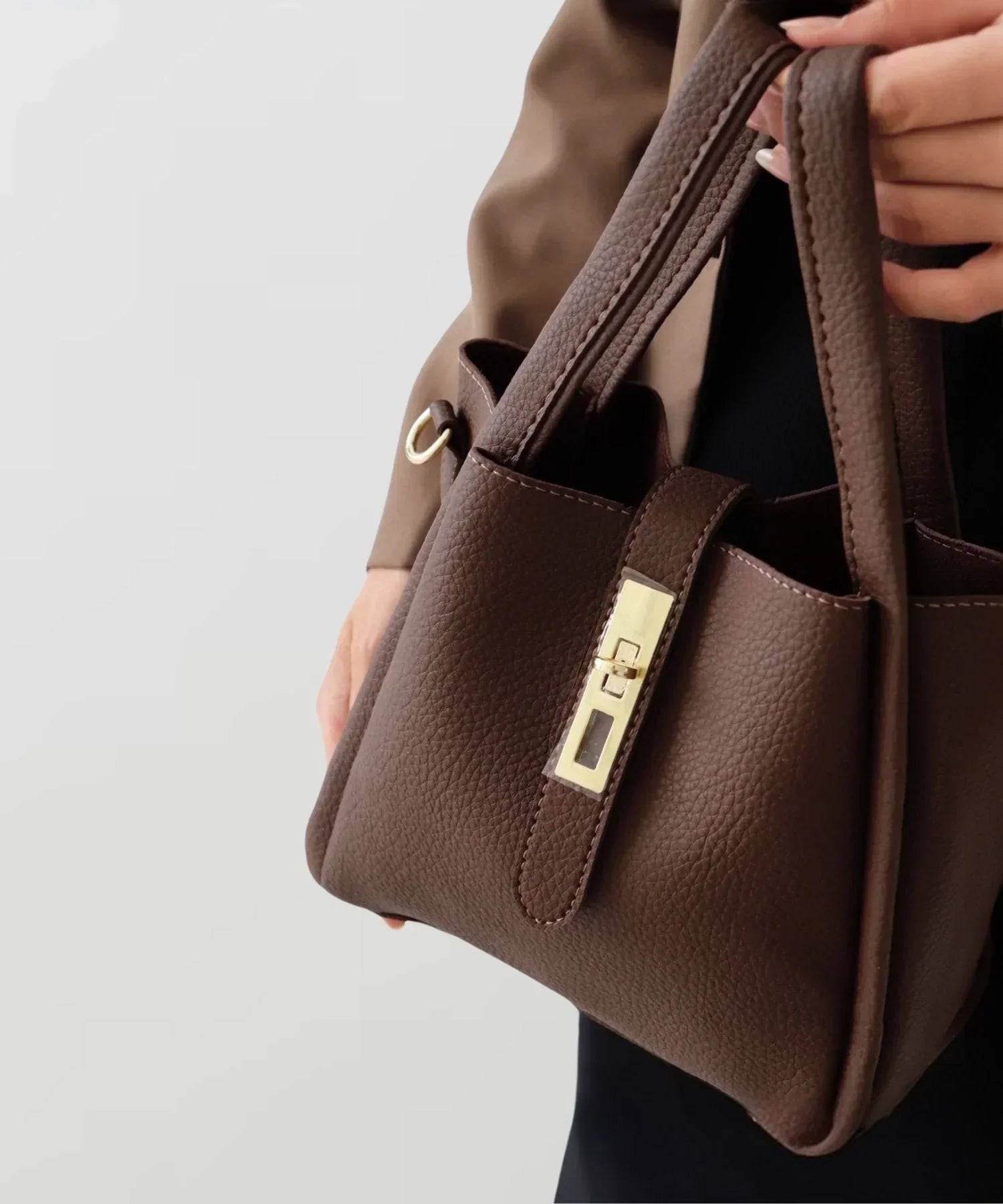 Women's Structured Handbag Featuring Top Handles and Gold Accents